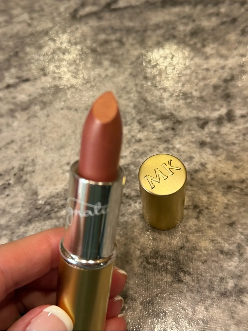 Mary Kay lipstick in the shade Juicy Peach